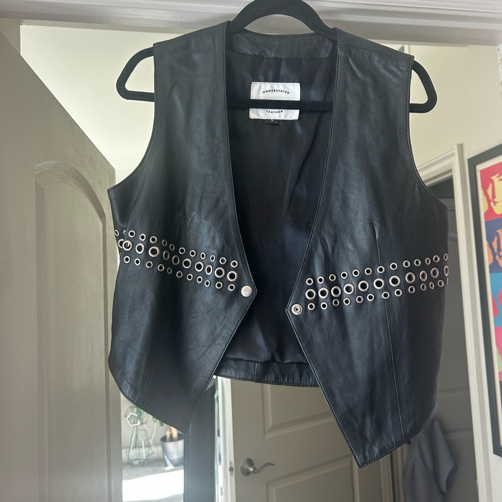 Stylish Black Leather Vest with Silver Accents